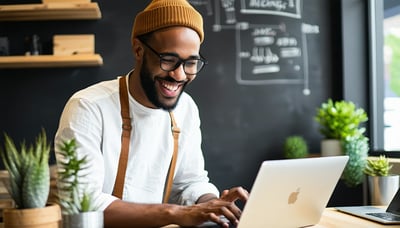 Illustration of a small business owner happily using digital tools on a laptop